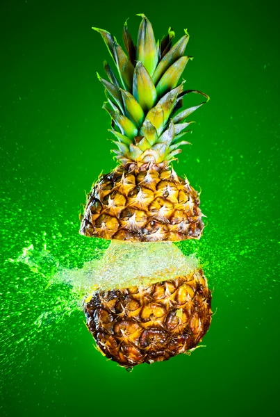 Pineapple Splashed Water Green Background — Stock Photo, Image