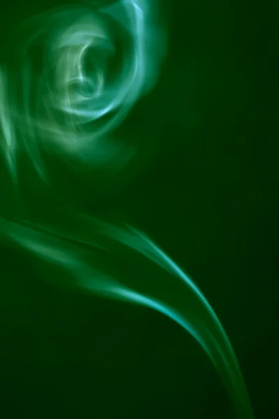 stock image Abstract green smoke on black background
