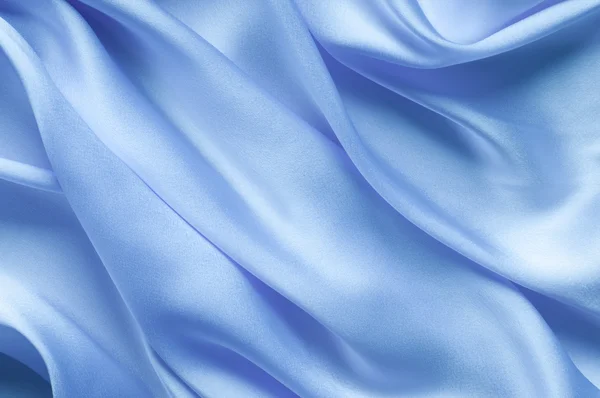 Niebieskim tle satyna #2 — Zdjęcie stockowe