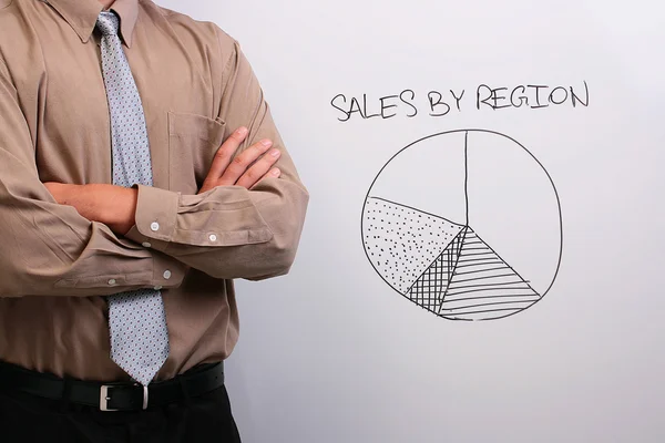 Man explaining a pie chart — Stock Photo, Image