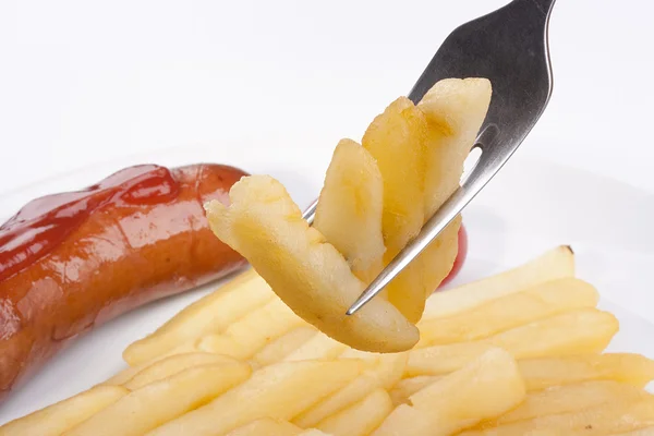 Fried potato on a fork — Stock Photo, Image