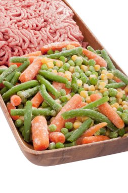 Frozen vegetables for the preparation of various culinary delicacies. clipart