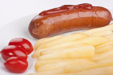 Sausage with a fried potato and tomatoes. clipart