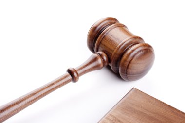 Wooden hammer used in court and in auctions. clipart