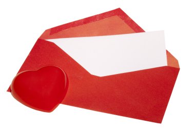 Red heart laying next to a red envelope with white paper on a white background. clipart