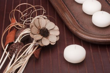 Scented candles and chopsticks made in a decorative form for use in aromatherapy SPA salons and wellness medicine. clipart