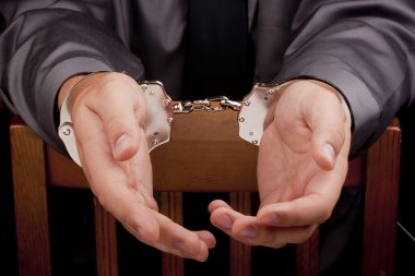 Arrested in handcuffs clipart