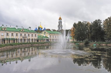 Monastic pond with fountain in Sergiev Posad, Russia clipart