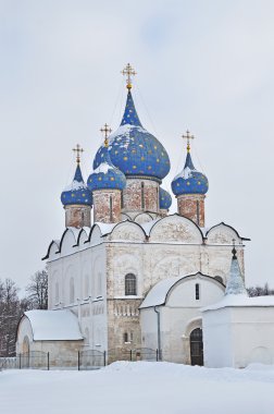 View of Rozhdestvensky cathedral in Suzdal Kremlin, winter time, Russia clipart