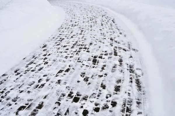 Snow covered pavement background — Stock Photo, Image