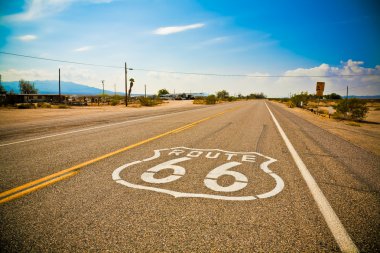 Historic Route 66 sign on the road clipart