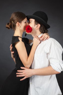 Couple kissing and holding rose clipart