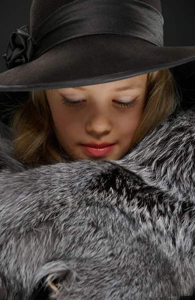 Portrait beautiful young lady in grey fur and hat — Stock Photo, Image