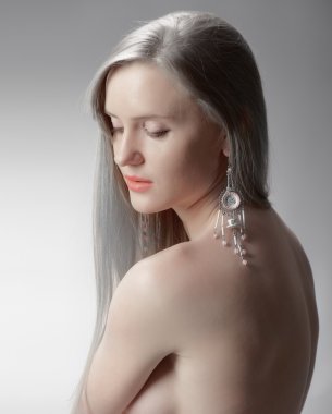 Sexy naked woman with jeweller decor clipart