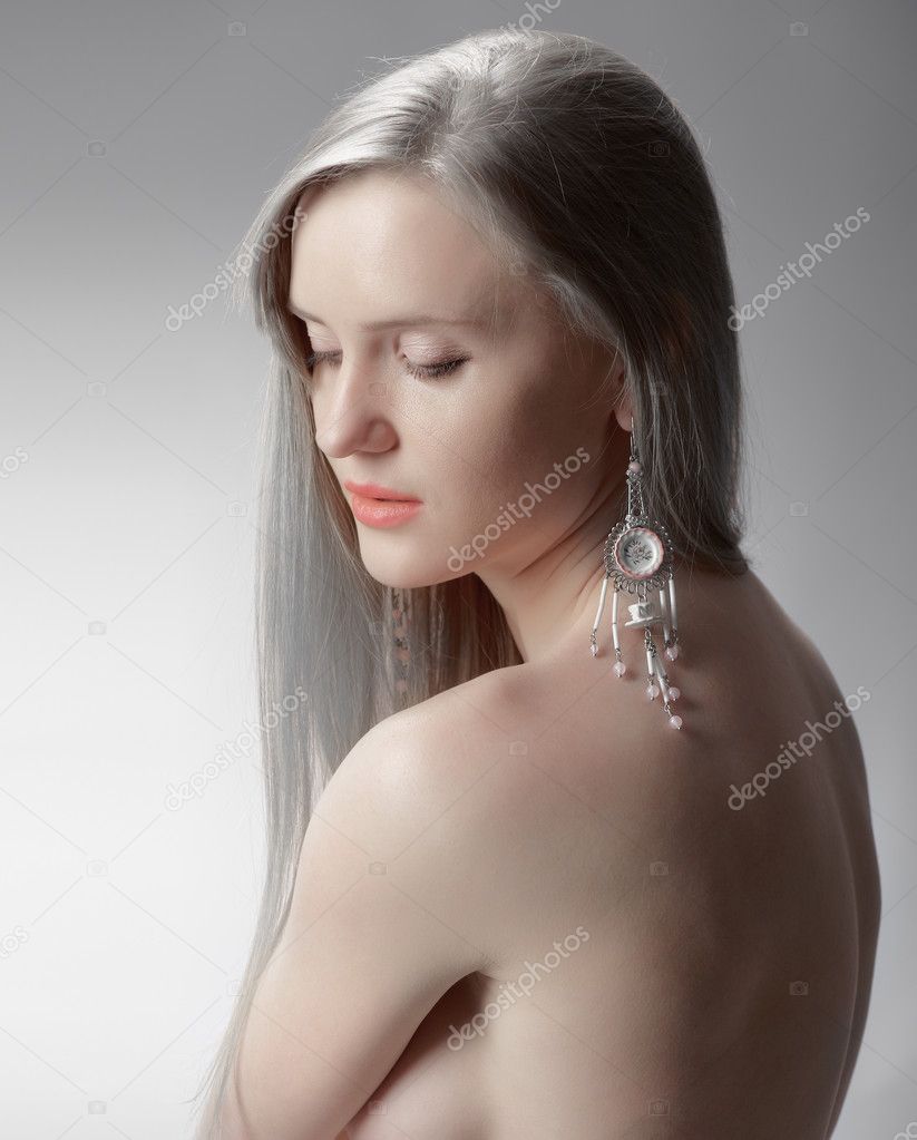 Sexy naked woman with jeweller decor