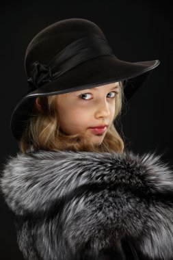 Portrait beautiful young lady in grey fur and hat clipart