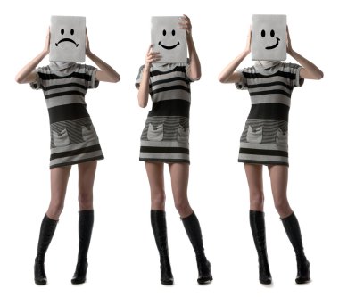 Tree girls holding happy and sad face masks symbolizing changing clipart