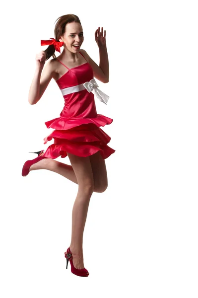 年轻漂亮的女孩穿着一件红色连衣裙 — 图库照片