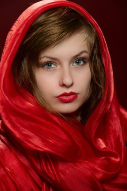 Young girl in a red hood clipart