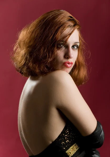 Retrato de uma linda menina de cabelo vermelho sexy — Fotografia de Stock