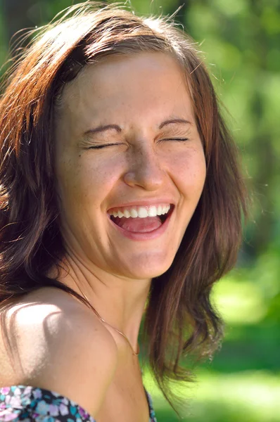 Funny woman in summer park — Stock Photo, Image
