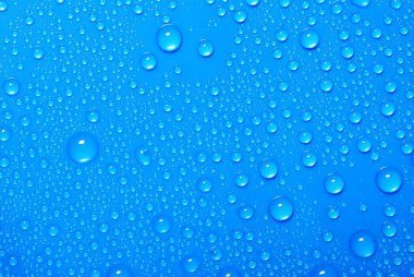 Blue water drops on glass clipart