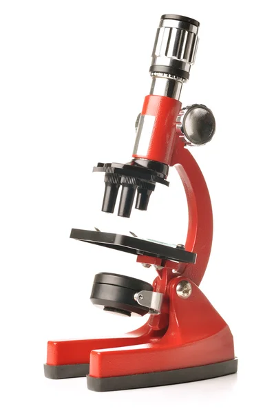 孤立在白色背景上的红色显微镜 — 图库照片