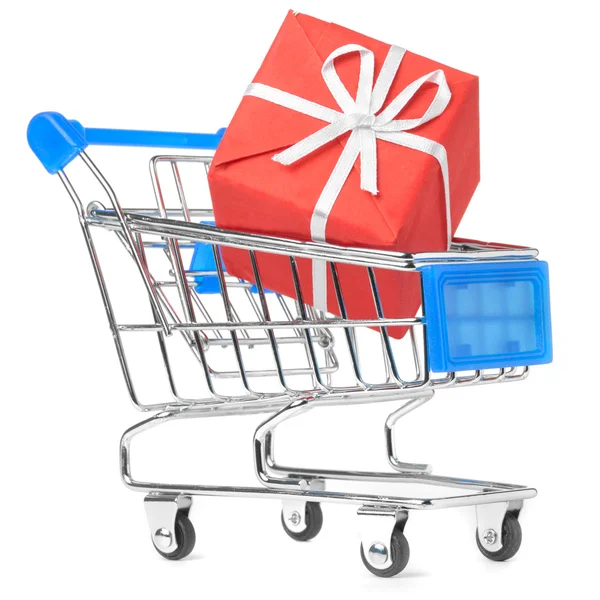 Closeup of a shopping cart with gift — Stock Photo, Image