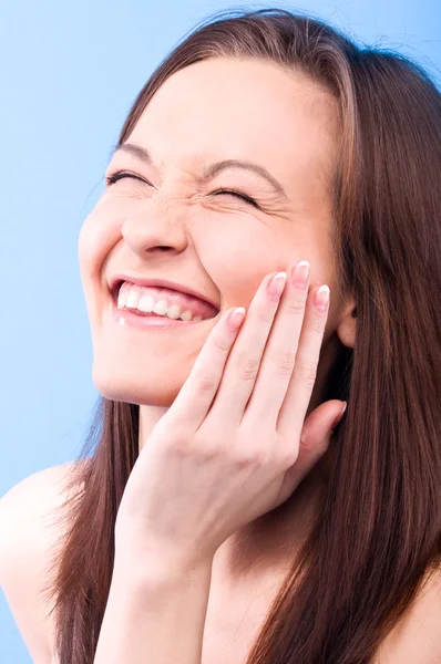 Laughing Beautiful Woman Touching Her Face Looking Camera — Stock Photo, Image