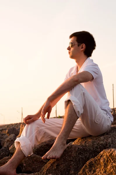Handsome Man Sitting Stones Sunrise — Stock Photo, Image