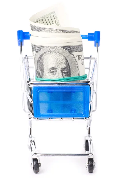 Dolarových bankovek v nákupní košík izolovaných na bílém — Stock fotografie