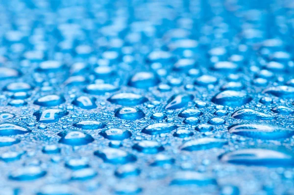 Blauwe Water Druppels Glas Ondiep Dof — Stockfoto