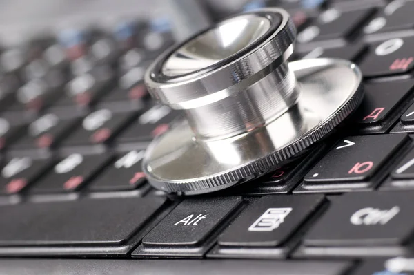 Stethoscope on keyboard — Stock Photo, Image