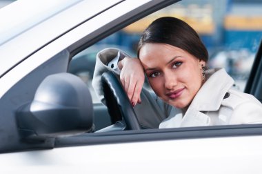 Woman in a car clipart