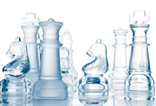 Transparentní sklo šachové figurky — Stock fotografie