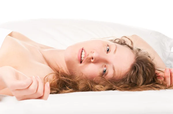 Женщина в постели — стоковое фото