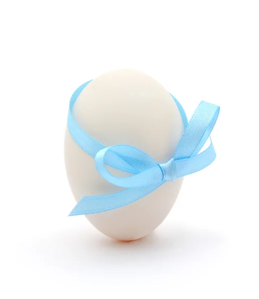 stock image Egg with a blue bow