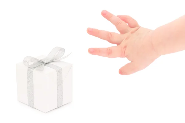 Hand taking a gift. — Stockfoto
