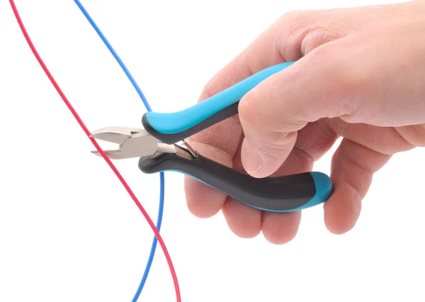 Hand, pliers and cable — Stock Photo, Image
