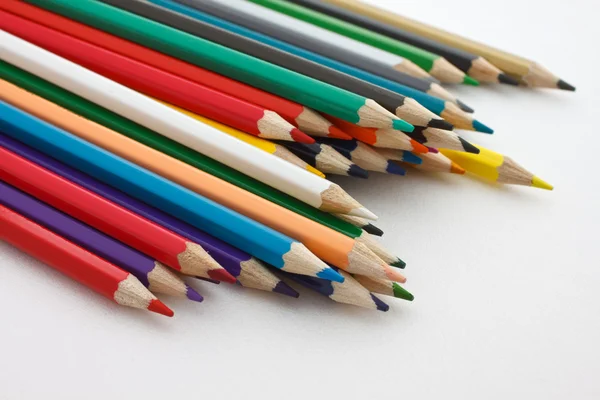 A number of colored pencils on white background — Stock Photo, Image