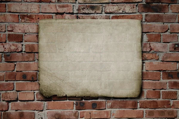 Carta su muro di mattoni — Foto Stock