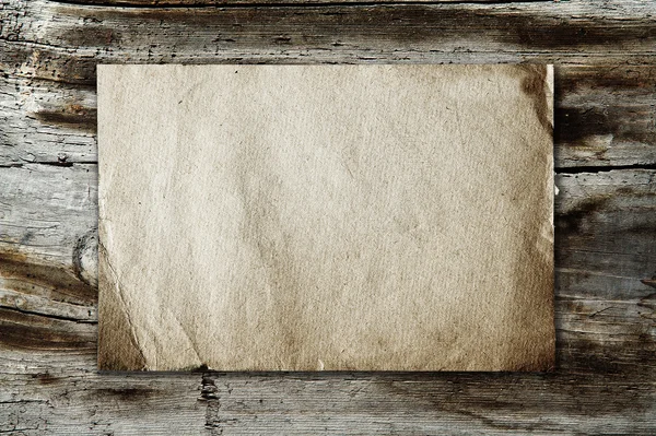 Carta vintage su texture in legno — Foto Stock