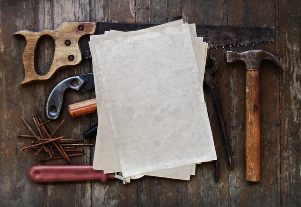 Tools with old paper — Stock Photo, Image