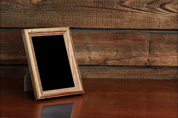 Frame on table — Stock Photo, Image