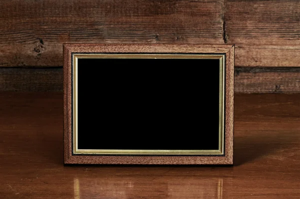 Frame on table — Stock Photo, Image