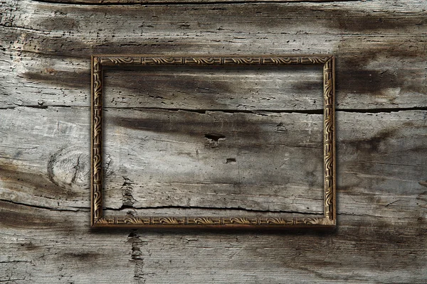 Marco sobre fondo de madera —  Fotos de Stock