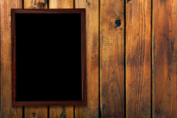 Винтажная рама на деревянной стене — стоковое фото