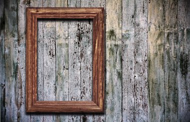 Frame on wooden background clipart