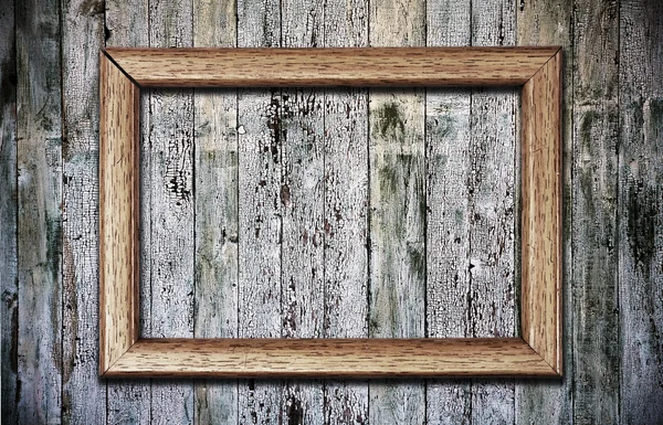 Quadro no fundo de madeira — Fotografia de Stock