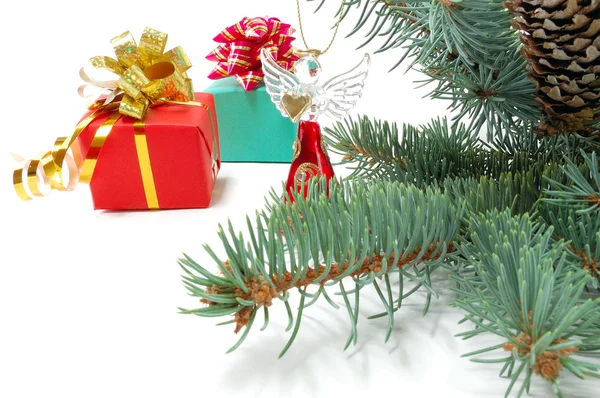 Gifts on fur-tree branches — Stock Photo, Image